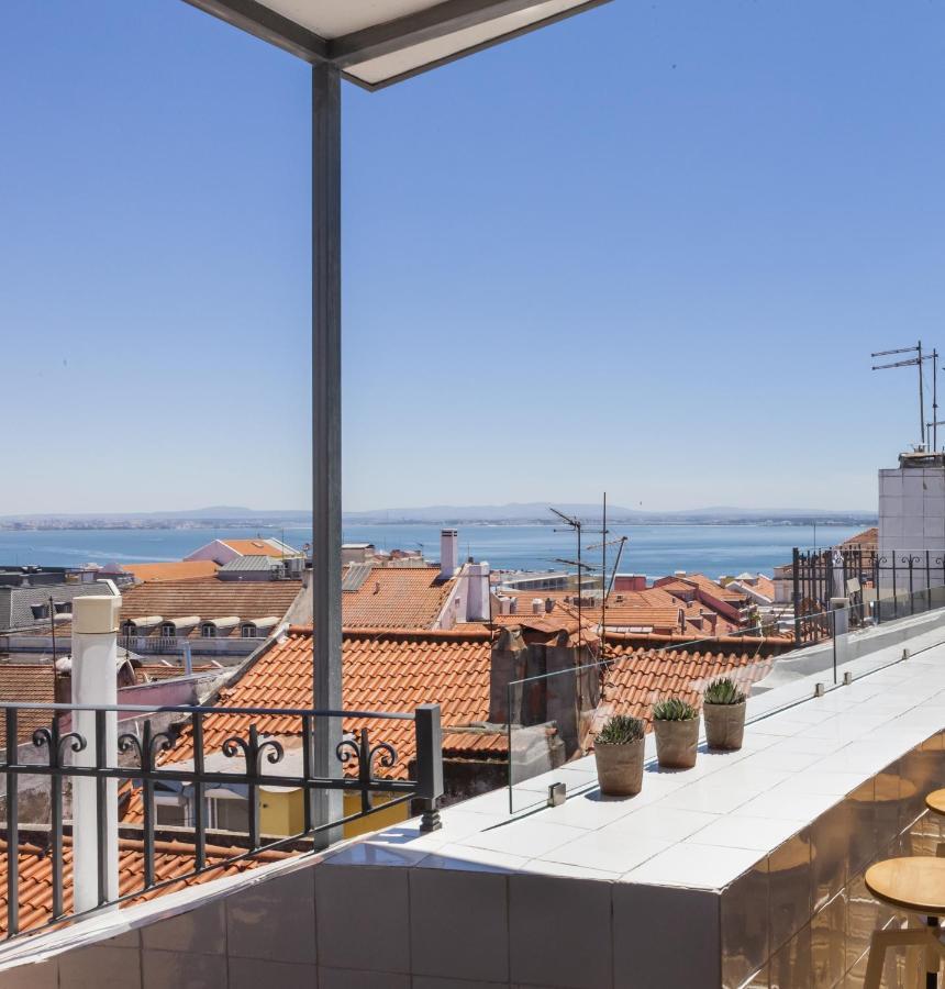 Apartment Chiado Rooftop Retreat: 19th Century Charm With River Views