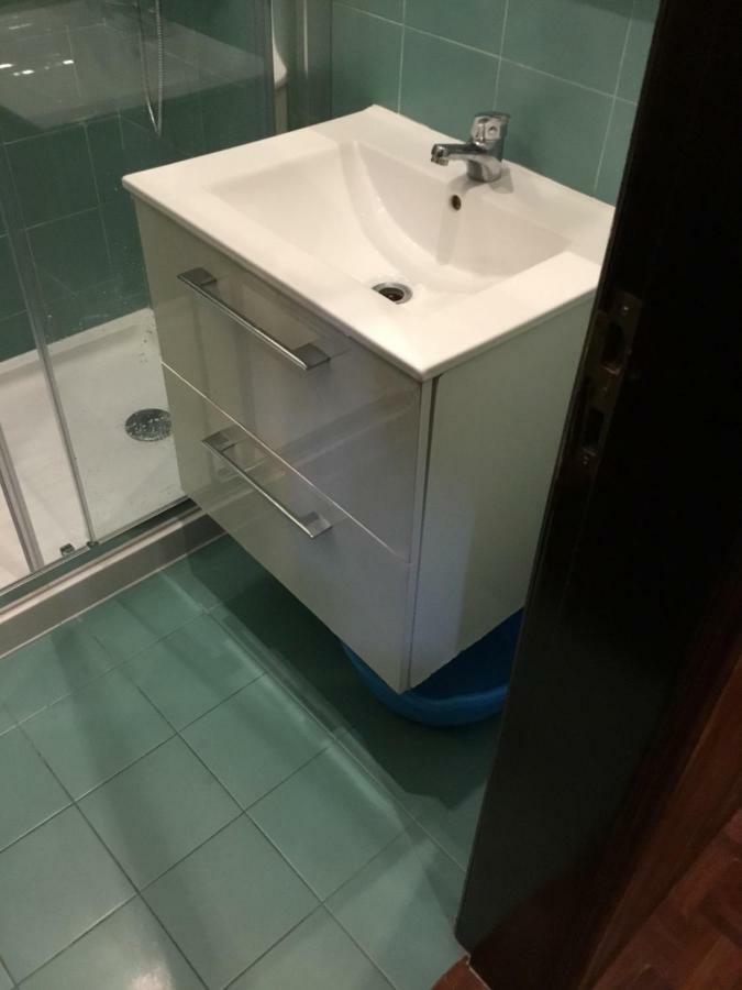 Quarto em Acomodações Particulares Bisengototo Homestay *